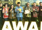 Bupati Simalungun Terima Penghargaan UHC Kategori Madya: Capaian Kepesertaan Tembus 101,67%