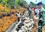 Satgas TMMD ke-127 Kodim 0207/Simalungun dan Warga Kompak Bangun Drainase di Nagori Bahapal